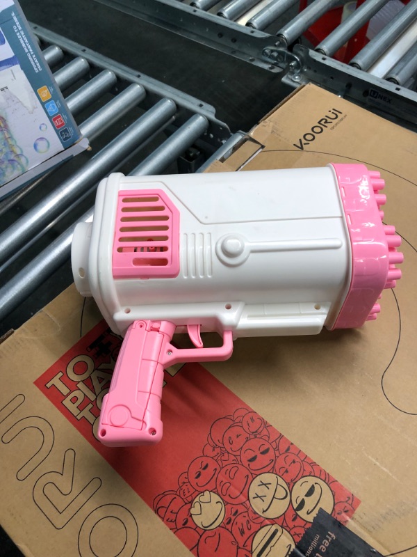 Photo 3 of Bubble Machine Gun - 2022 Upgrade 64-Hole Bubble Gun Rocket Boom Bubble Machine Rocket Launcher Bubble Maker Blower for Kids Girls Adults Party (3rd Generation) - Pink 64 Pink