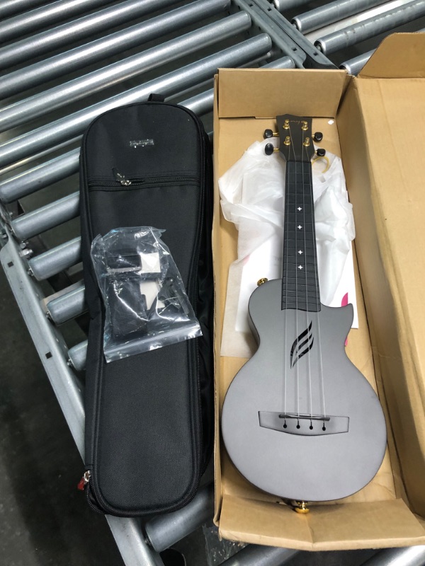 Photo 2 of Enya Soprano Ukulele 21 Inch Carbon Fiber Travel Ukelele Nova U Mini Simple Yukalalee With Beginner Kit Ukalalee includes Case Strap Capo Strings (Black) 21 inch Black