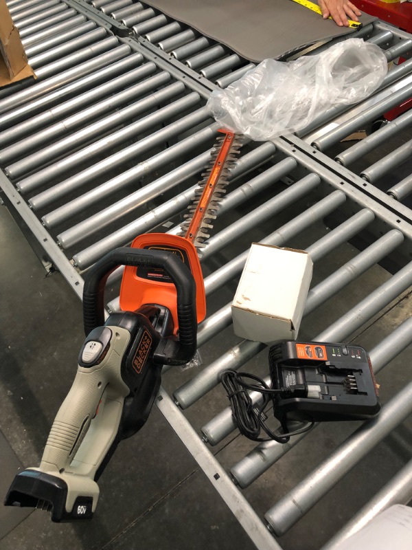 Photo 2 of BLACK+DECKER 60V MAX Cordless Hedge Trimmer, 24-Inch with Easy-Fit All Purpose Glove (LHT360CFF & BD505L) Kit 
--- No Gloves--- Unable to Test--- 