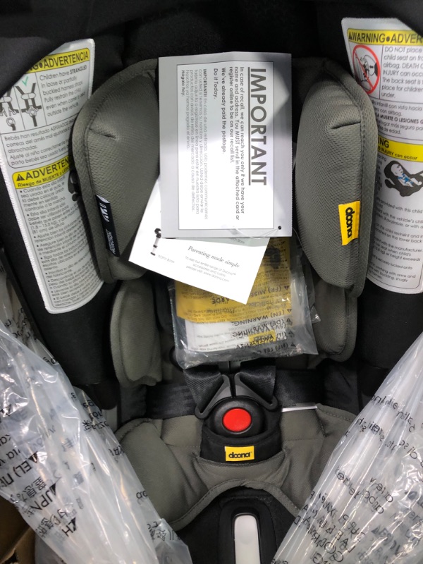 Photo 1 of Doona Infant Car Seat & Latch Base - Rear Facing Car Seat and Car Seat Base, Car Seat to Stroller in Seconds - US Version, Nitro Black