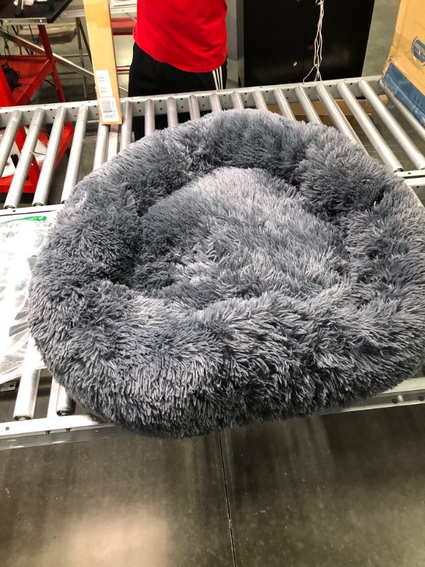 Photo 1 of Bedsure Calming Dog Bed for Large Dogs - Donut Washable Large Pet Bed, 36 inches Anti Anxiety Round Fluffy Plush Faux Fur Dog Bed, Fits up to 100 lbs Pets, Dark Grey