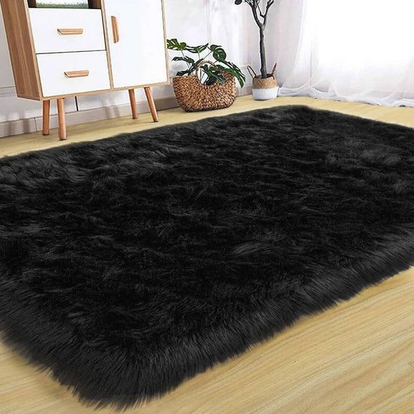Photo 1 of Black fur rug (indoors)