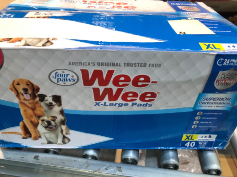 Photo 3 of Four Paws Wee-Wee Pee Pads for Dogs and Puppies Training l Gigantic, XL, Standard & Little l Absorbent Pee Pads for Training Puppies, Leak-Proof 6-Layer Technology, 24 Hour Protection Guaranteed XL 40 Count