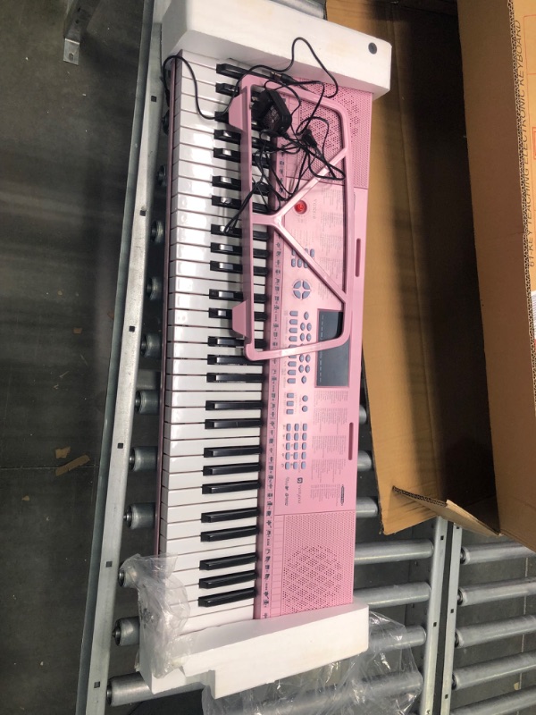 Photo 1 of Vangoa VGK610 Piano Keyboard, 61 Mini Keys Portable Music Keyboard for Beginners with , 3 Teaching Modes, 350 Tones, 350 Rhythms, 30 Demos, Pink 61 Mini Keys pink