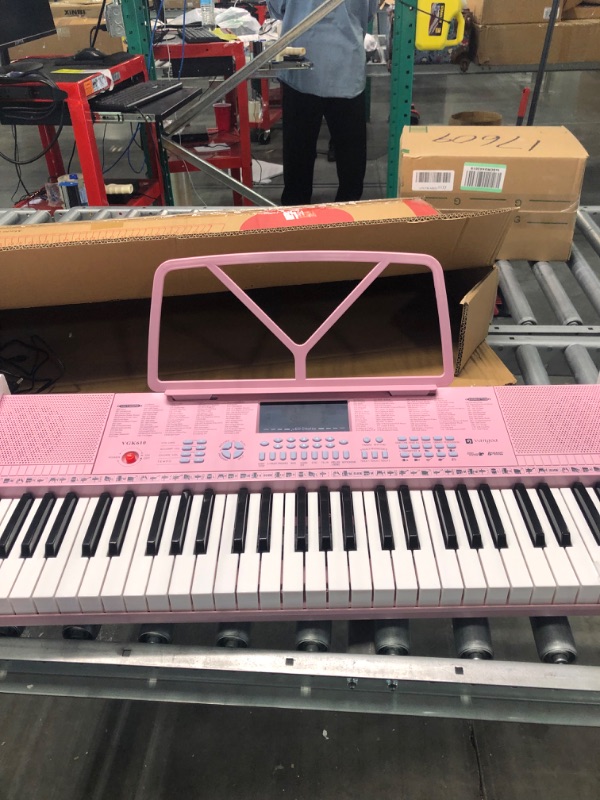 Photo 1 of Vangoa VGK610 Piano Keyboard, 61 Mini Keys Portable Music Keyboard for Beginners with , 3 Teaching Modes, 350 Tones, 350 Rhythms, 30 Demos, Pink 61 Mini Keys pink