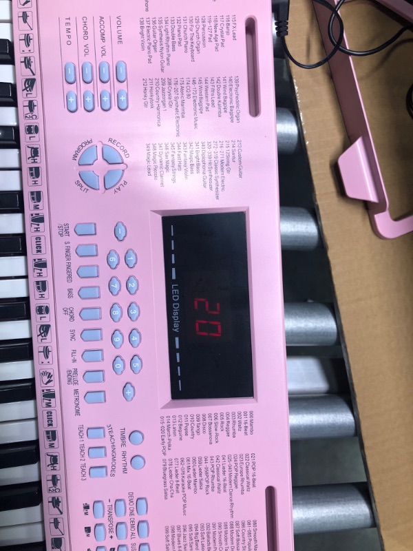 Photo 1 of Vangoa VGK610 Piano Keyboard, 61 Mini Keys Portable Music Keyboard for Beginners with , 3 Teaching Modes, 350 Tones, 350 Rhythms, 30 Demos, Pink 61 Mini Keys pink