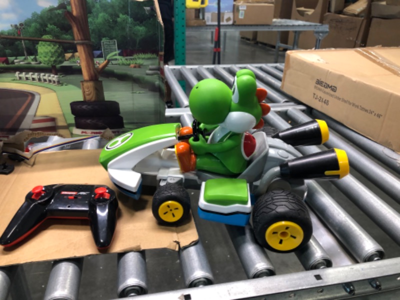 Photo 2 of Carrera RC 370162108X Official Licensed Mario Kart Yoshi Race Kart 1:16 Scale 2.4 GHz Splash Proof Remote Control Car Vehicle with Sound and Body Tilting Action - Rechargeable Battery - Kid Toys Mario Kart Race Kart - Yoshi