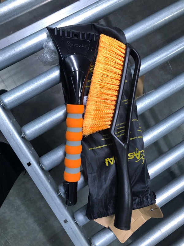 Photo 3 of AstroAI 27 Inch Snow Brush and Detachable Ice Scraper with Ergonomic Foam Grip for Cars, Trucks, SUVs (Heavy Duty ABS, PVC Brush) Small orange