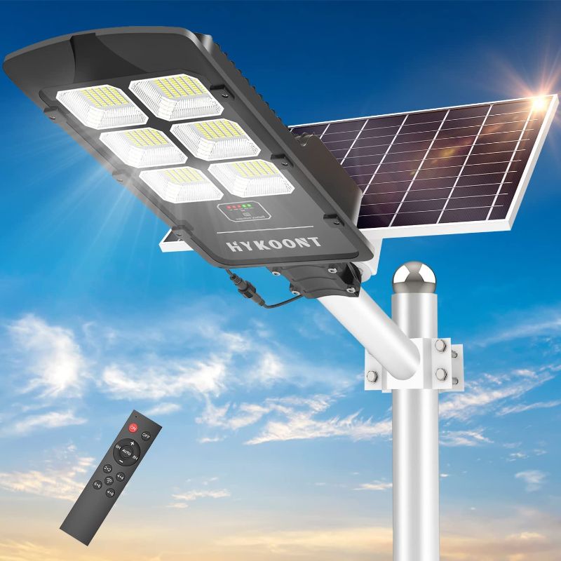 Photo 1 of HYKOONT 1000W Solar Street Light, Dusk to Dawn Solar Led Outdoor Light with Remote Control, 6500K Daylight White IP66 Waterproof Security Led Flood Light for Yard, Garden, Street, Playgroud