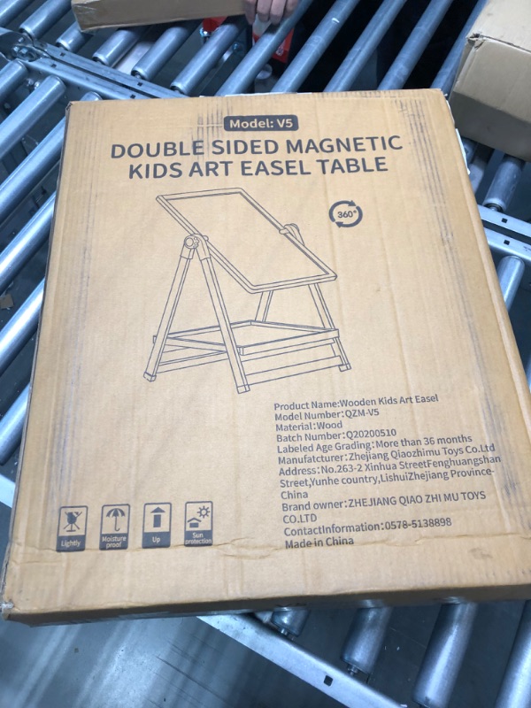 Photo 1 of QZMTOY Kids Art Easel, Deluxe Standing Easel Set, Adjustable Art Table, Magnetic Dry Erase Board&Chalkboard Double Sided Stand, 360°Rotating Drawing Easels with Art Supplies, Adjust Height 28-39in Medium