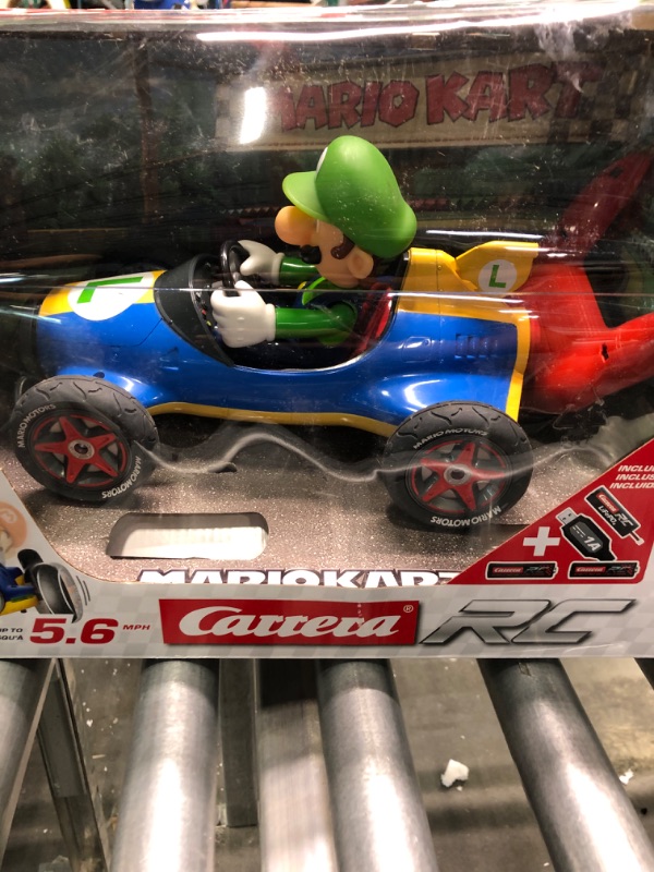 Photo 6 of Carrera RC Official Licensed Mario Kart Mach 8 Luigi 1: 18 Scale 2.4 Ghz Remote Radio Control Car with Rechargeable Lifepo4 Battery - Kids Toys Boys/Girls, (Model: 181067) Mario Kart Mach 8 - Luigi