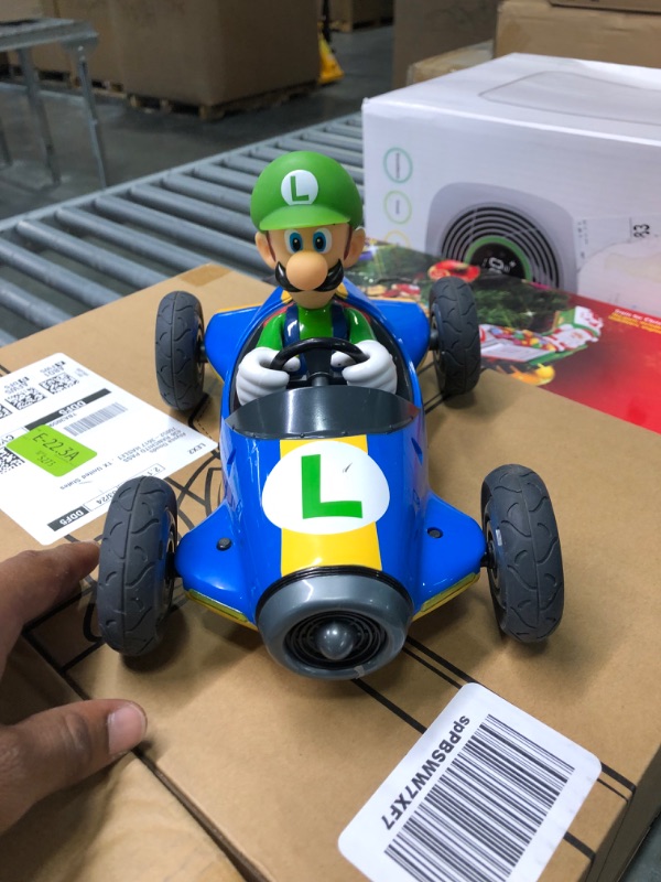 Photo 4 of Carrera RC Official Licensed Mario Kart Mach 8 Luigi 1: 18 Scale 2.4 Ghz Remote Radio Control Car with Rechargeable Lifepo4 Battery - Kids Toys Boys/Girls, (Model: 181067) Mario Kart Mach 8 - Luigi