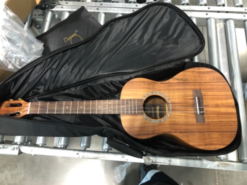 Photo 4 of Caramel CB207 Acacia Baritone Acoustic Electric Ukulele with Truss Rod with Additional Strings, Padded Gig Bag, Strap and EQ cable Laminated