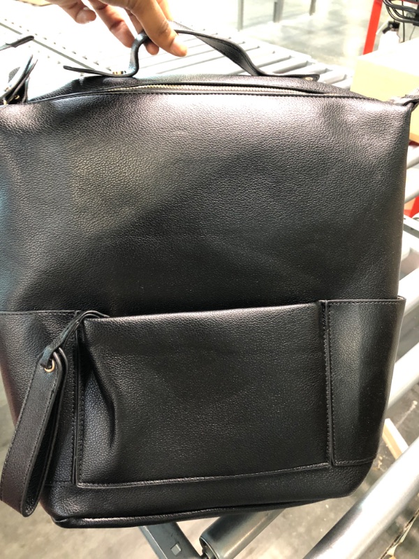 Photo 1 of all black leather woman backpacl