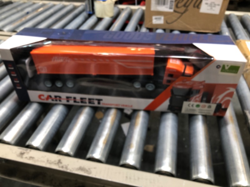 Photo 1 of Vokodo RC Semi Truck and Trailer 18 Inch 2.4Ghz Fast Speed 1:16 Scale Rechargeable Battery Remote Control Tractor Tanker Hauler Car Big Rig 18 Wheeler Toy for 3 4 5 6 7 8 Year Boys Kids (Orange)