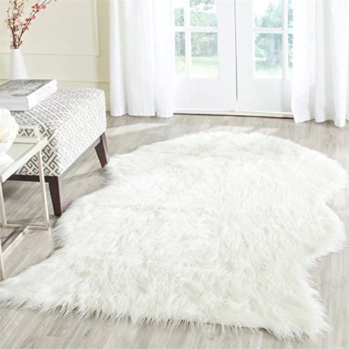 Photo 1 of SAFAVIEH Faux Sheep Skin Collection ' Ivory FSS117A Silken Glam 2.35-inch Thick Area Rug