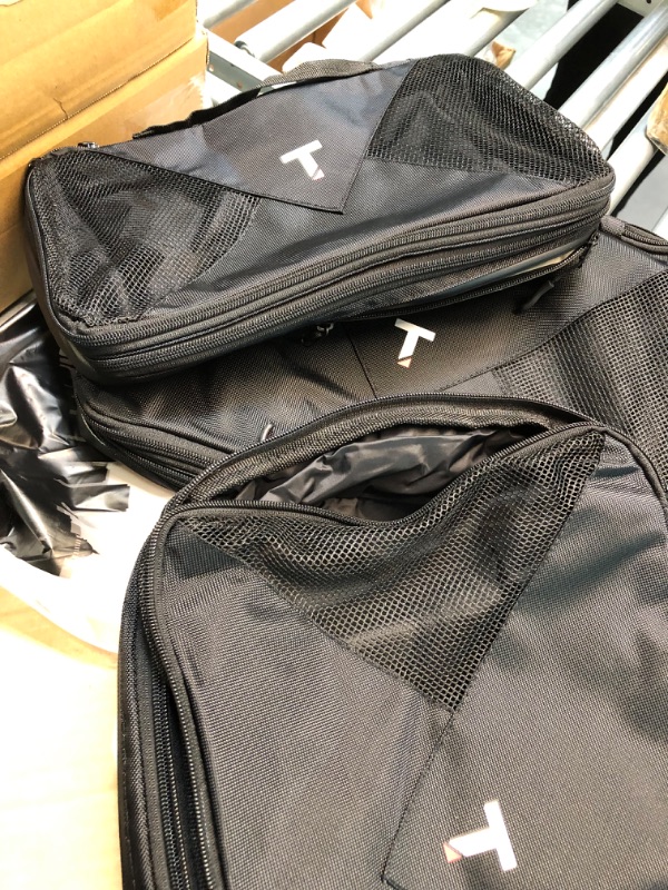 Photo 6 of Compression Packing Cubes | Clean & Dirty Compartments w/Flexible Separator | New Patent Pending Anti-Snag-Zipper Construction | YKK Zippers (Black | Set of 4 | 2 L + 2 M)