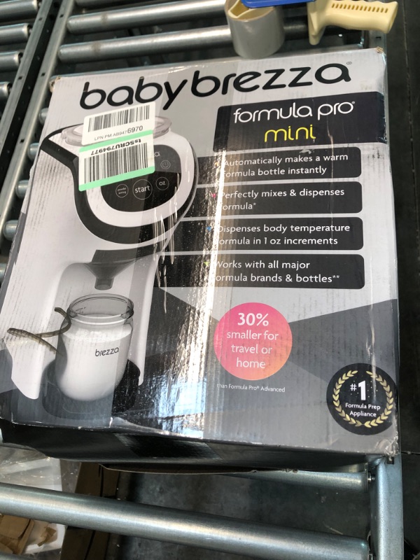 Photo 2 of Baby Brezza Formula Pro Mini Baby Formula Maker – Small Baby Formula Mixer Machine Fits Small Spaces and is Portable for Travel– Bottle Makers Makes The Perfect Bottle for Your Infant On The Go Formula Pro Mini Dispenser Machine