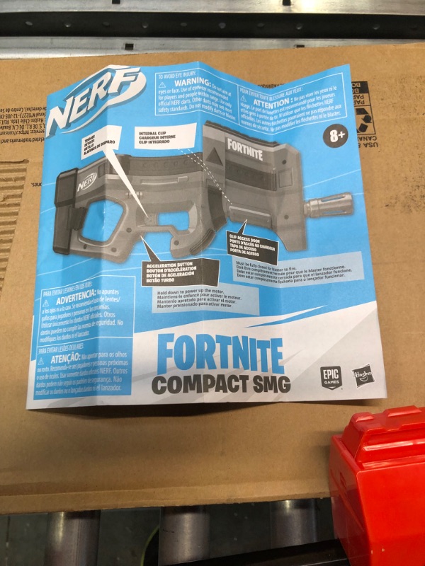 Photo 1 of NERF Fortnite Compact SMG Motorized Blaster, Ultra Red Wrap Design, 8-Dart Internal Clip, Electric Semi Auto Fortnite Toy Blaster