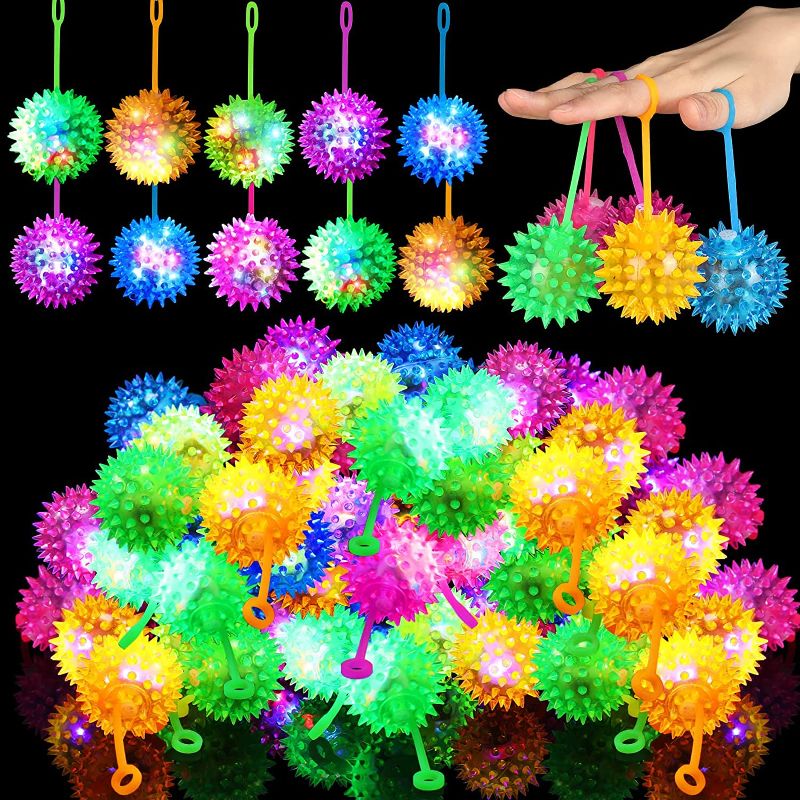 Photo 1 of Bulk LED Fidget Spiky Ball Light Up Spiky Bouncy Ball Flashing Squeaky Ball Blinking Sensory Toy Multicolor Puffer Balls Stress Relief Balls Rubber Toy for Pet Dog Cat Kids, Teens,
