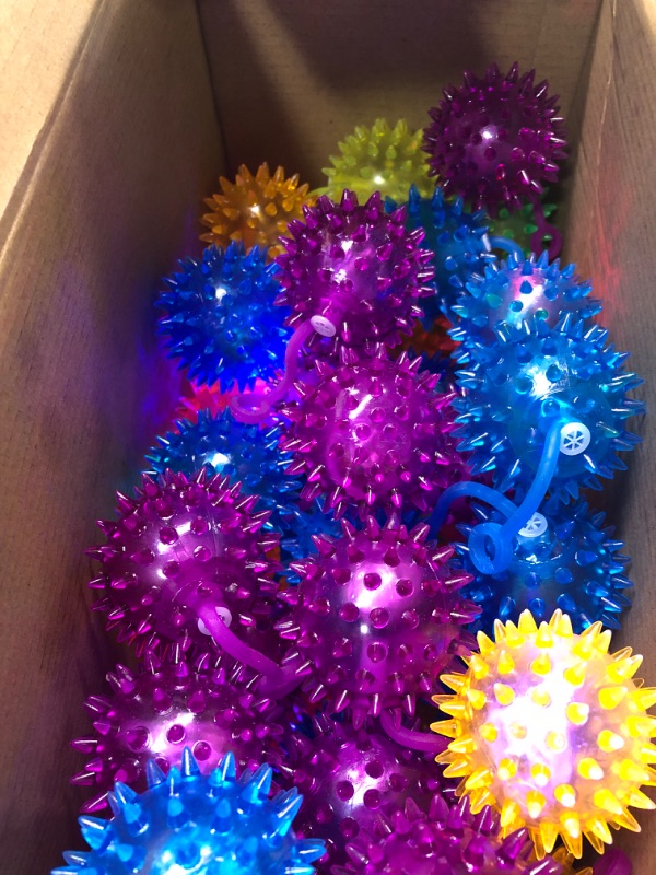 Photo 4 of Bulk LED Fidget Spiky Ball Light Up Spiky Bouncy Ball Flashing Squeaky Ball Blinking Sensory Toy Multicolor Puffer Balls Stress Relief Balls Rubber Toy for Pet Dog Cat Kids, Teens,