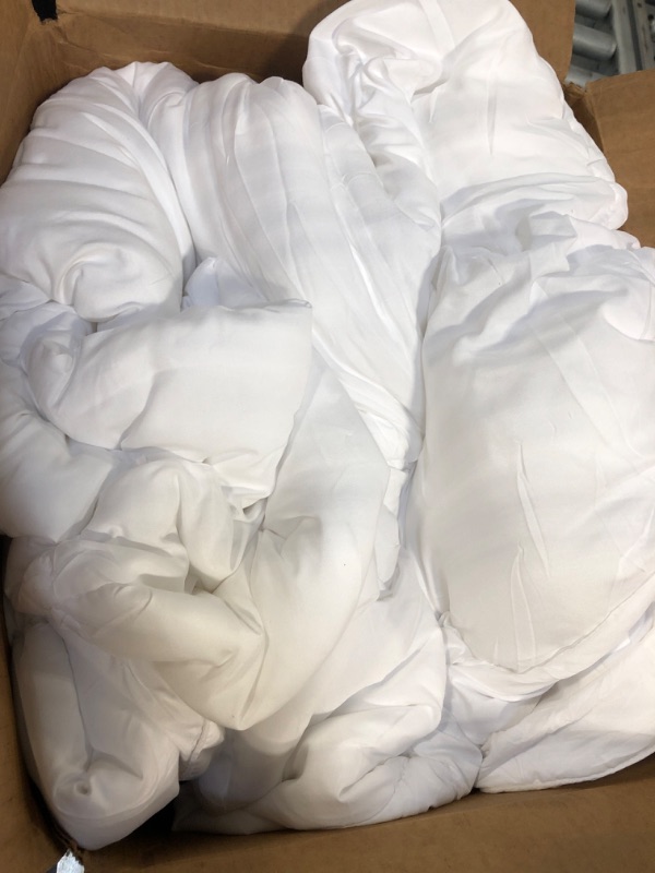 Photo 1 of white comforter/ queen size 
