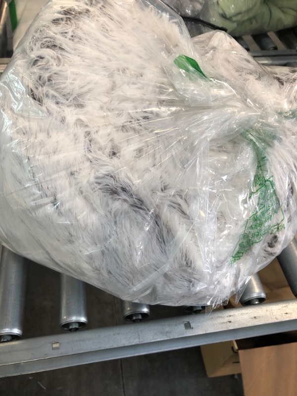 Photo 1 of fluffy white and black pet bed