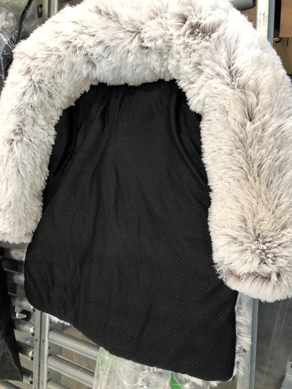 Photo 1 of fluffy white and black pet bed
