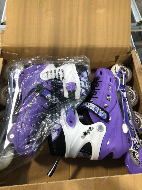 Photo 1 of OBENSKY Girls Skates Adjustable Inline Skates for Boys and Girls, Fun Illuminating Beginner Inline Skates for Kids  -- size large