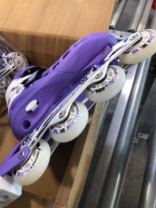 Photo 1 of OBENSKY Girls Skates Adjustable Inline Skates for Boys and Girls, Fun Illuminating Beginner Inline Skates for Kids  -- size large