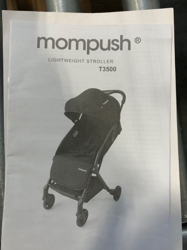 Photo 2 of Mompush Lithe, Lightweight Stroller, Compact One-Hand Fold Luggage-Style Travel Stroller for Airplane Friendly, Reclining Seat and XL Canopy, with Rain Cover & Travel Carry Bag & Cup Holder Lavender