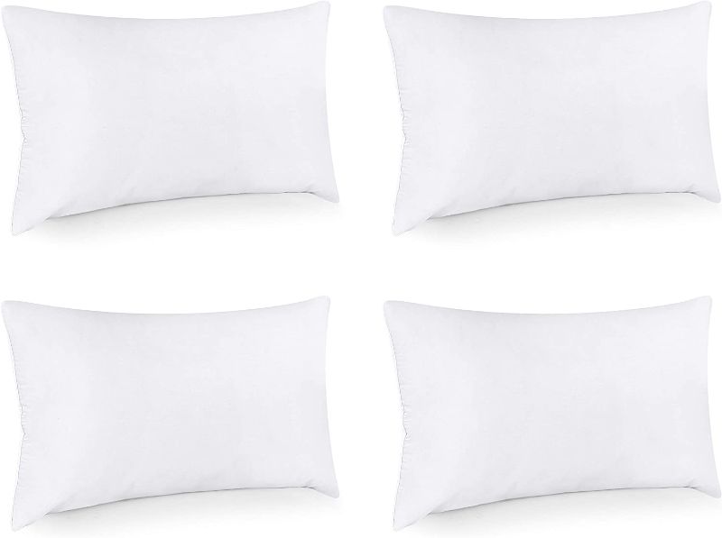 Photo 1 of Utopia Bedding Throw Pillows (Set of 4, White), 12 x 20 Inches Pillows for Sofa, Bed and Couch Decorative Stuffer Pillows
