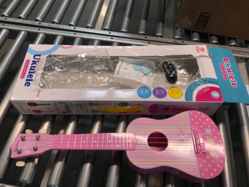 Photo 2 of HANMUN Unicorn Musical Ukulele Guitar Toys - 23 Inch Pink Guitar with 4 Strings Musical Instruments Learning Educational Toys for Kids Children Girls Boys Adult Children (Pink)