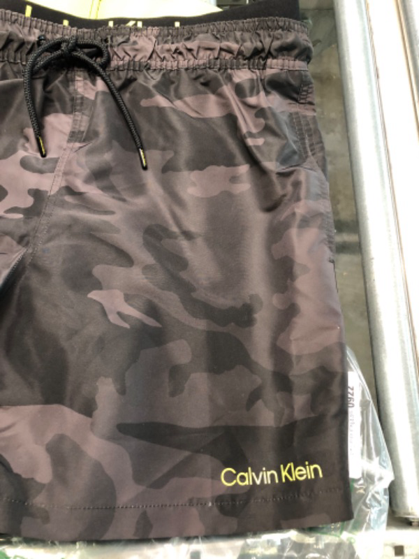 Photo 1 of Calvin Klein Men's Standard Uv Protected Quick Dry Swim Trunk--LARGE