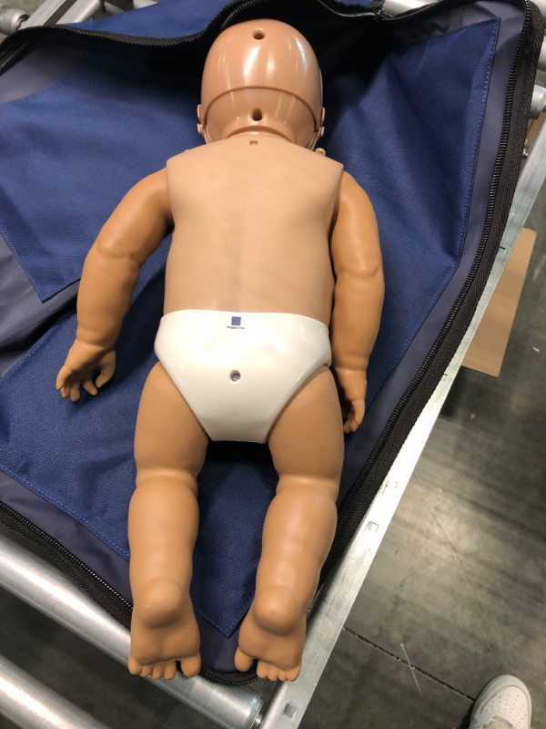 Photo 5 of CPR Savers Prestan Professional Infant CPR Training Manikin with 2019 AHA Feedback Monitor, Dark Skin, PP-IM-100M-DS
