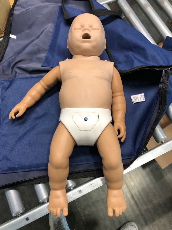 Photo 4 of CPR Savers Prestan Professional Infant CPR Training Manikin with 2019 AHA Feedback Monitor, Dark Skin, PP-IM-100M-DS
