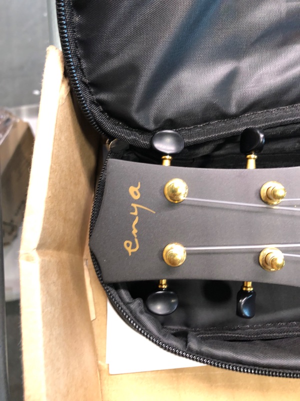 Photo 1 of Enya Soprano Ukulele 21 Inch Carbon Fiber Travel Ukelele Nova U Mini Simple Yukalalee With Beginner Kit Ukalalee includes Case Strap Capo Strings (Black) 21 inch Black