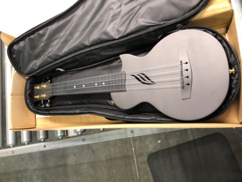 Photo 1 of Enya Soprano Ukulele 21 Inch Carbon Fiber Travel Ukelele Nova U Mini Simple Yukalalee With Beginner Kit Ukalalee includes Case Strap Capo Strings (Black) 21 inch Black