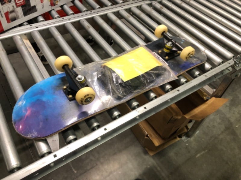 Photo 4 of PHOEROS Skateboards -Standard Skateboards for Kids Boys Girls Youths Beginners Starter-Complete Skate Boards 31''x 8''Canadian Maple Pro Cruiser blue light