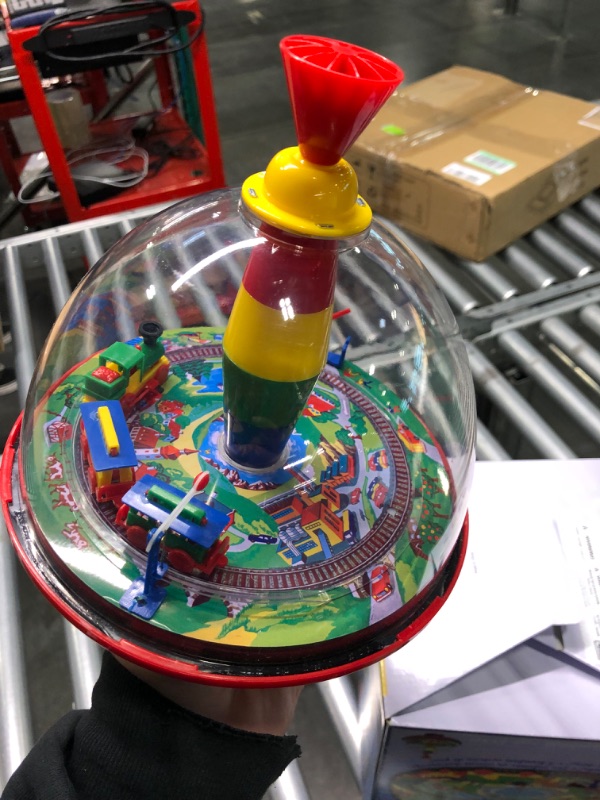 Photo 1 of Lena 52120 tin Toys Panorama Ø19 cm, Plastic Humming, Classical Pump Mechanism, Musical Locomotive, Stand, Spinning top for Children from 18 Months, Colorful --- Couldn't test needs batteries ----
