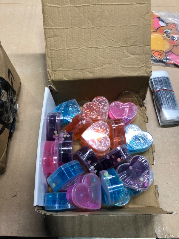 Photo 1 of JOYIN 28 Pcs Valentine's Day Clear Slime Hearts with Valentines Day Card Stress Relief Toy for Kids Valentine Classroom Exchange, Valentine Party Favors, Gift Exchange, Game Prizes
