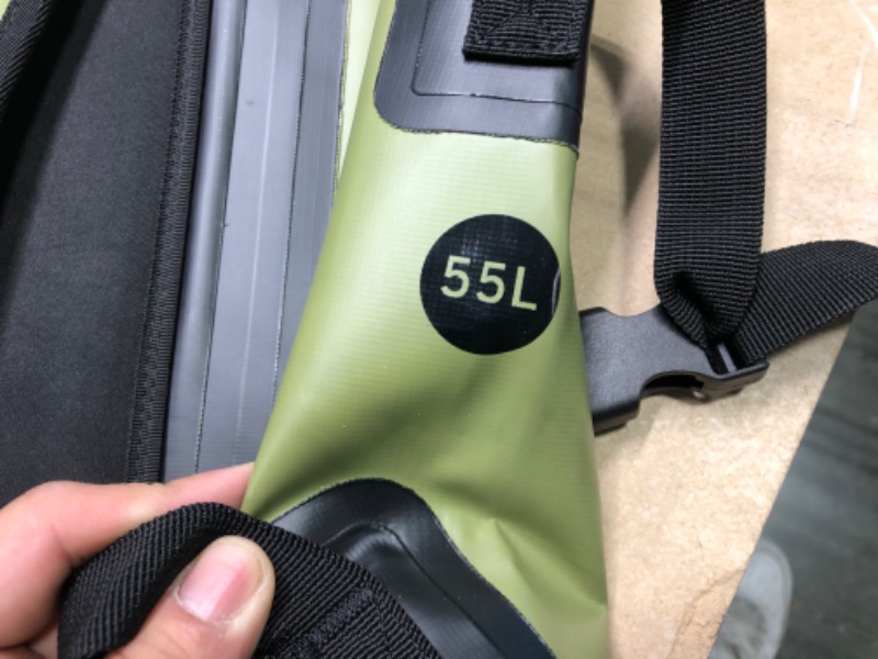 Photo 1 of Earth Pak Waterproof Backpack: 55L Heavy Duty Roll-Top Closure with Easy Access Front-Zippered Pocket and Cushioned Padded Back Panel for Comfort with IPX8 Waterproof Phone Case
