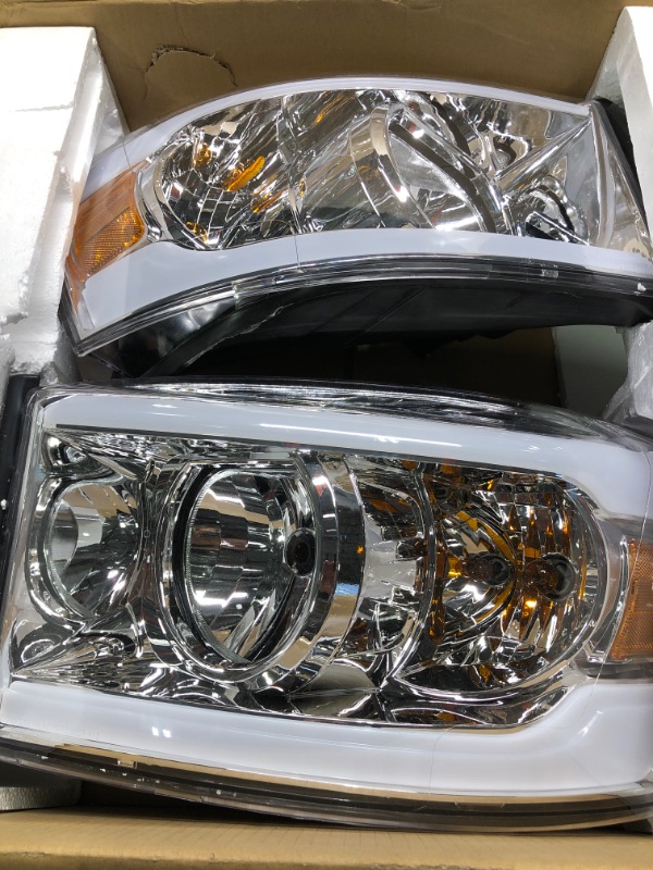 Photo 1 of MOSTPLUS Headlight Assembly Compatible with 2006-2008 Ram 1500/2006-2009 Dodge Ram 2500 3500 Front Lamp with Sequential Turn Light/ Led DRL--Chrome Housing/Clear Lens/Amber Reflector DRL/Dynamic Chrome/Clear/Amber