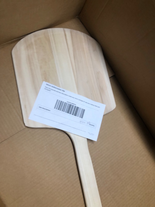 Photo 2 of New Star Foodservice 50233 Restaurant-Grade Wooden Pizza Peel, 14" L x 12" W Plate, with 22" L Wooden Handle, 36" Overall Length