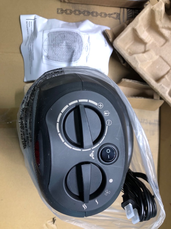 Photo 2 of Amazon Basics 1500W Oscillating Ceramic Heater with Adjustable Thermostat, Black Black Heater with Oscillating