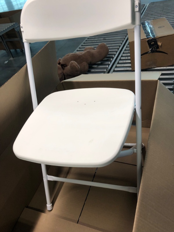 Photo 1 of Plastic Folding Chair