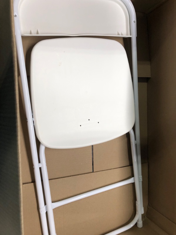 Photo 1 of Plastic Folding Chair
