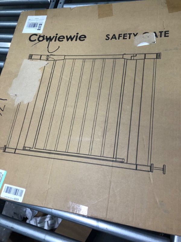 Photo 2 of Cowiewie Baby Gate for Stairs, 29.5-51.6" Extra Wide Walk Through Dog Gate with Door, Auto-Close Metal Safety Gate with Extensions for Doorways and Halls, Pressure Mounted No Drilling