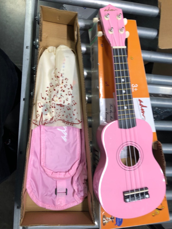 Photo 1 of ADM Soprano Ukulele for Beginners 21 Inch Hawaiian Wood Ukelele Kit for Kids Adult Student Starter Professional Ukalelee Pack Bundle with Free Lessons Gig Bag Strap Nylon String Tuner Pick, Pink