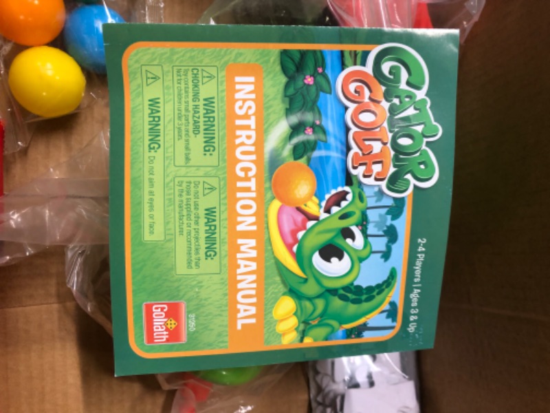 Photo 1 of Goliath Gator Golf – Putt The Ball Into The Gator’s Mouth to Score Game – Includes A Fun Colorful 24pc Puzzle (31250)
